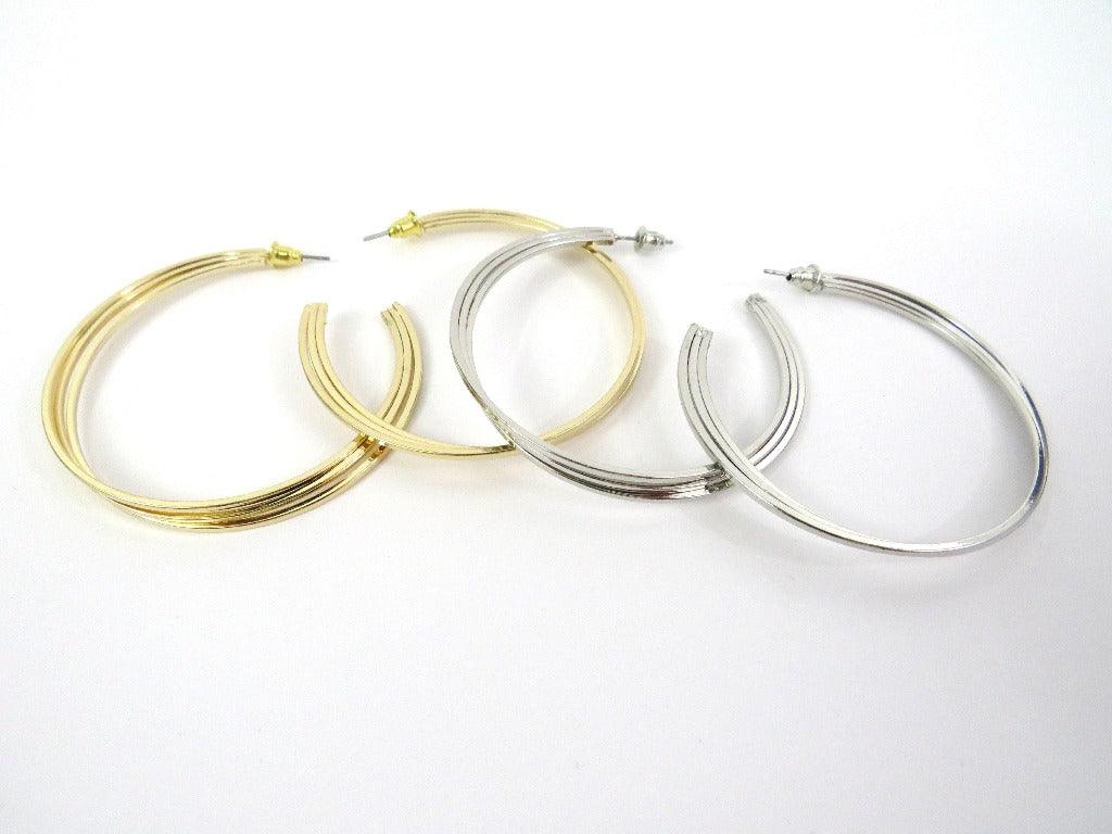 gold and silver layered hoop with post backs on a white background 